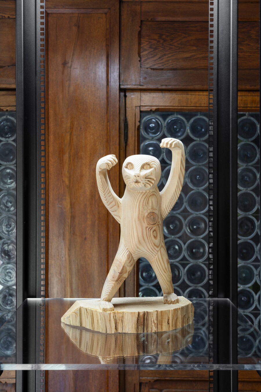 RAGE BAIT by Eva & Franco Mattes. Cursed cat wooden sculpture